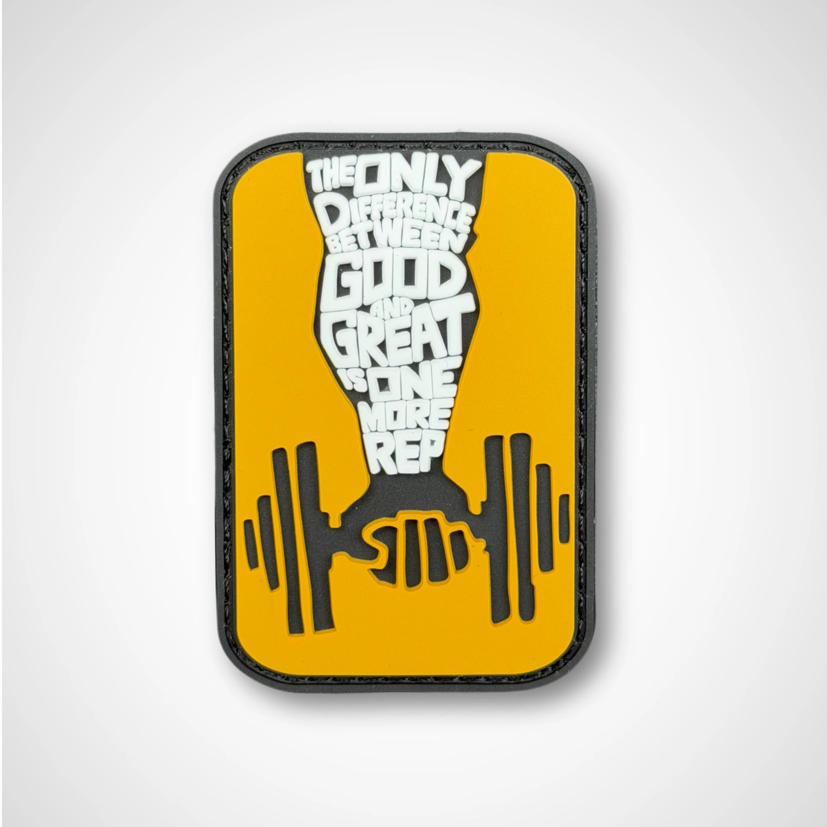 Yellow patch with black and white text and design on a white background