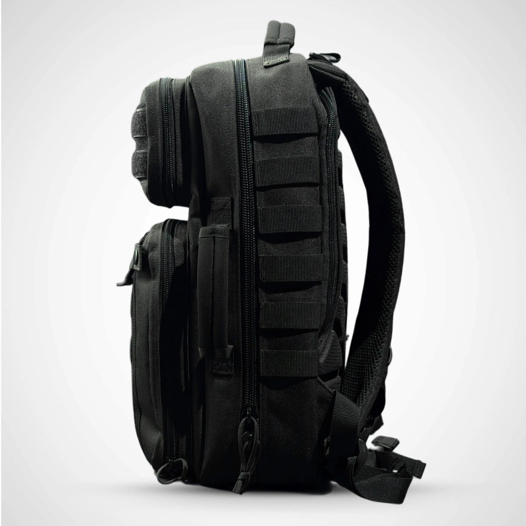 Side view of HONO tactical backpack 25 L , with side handle for grip 