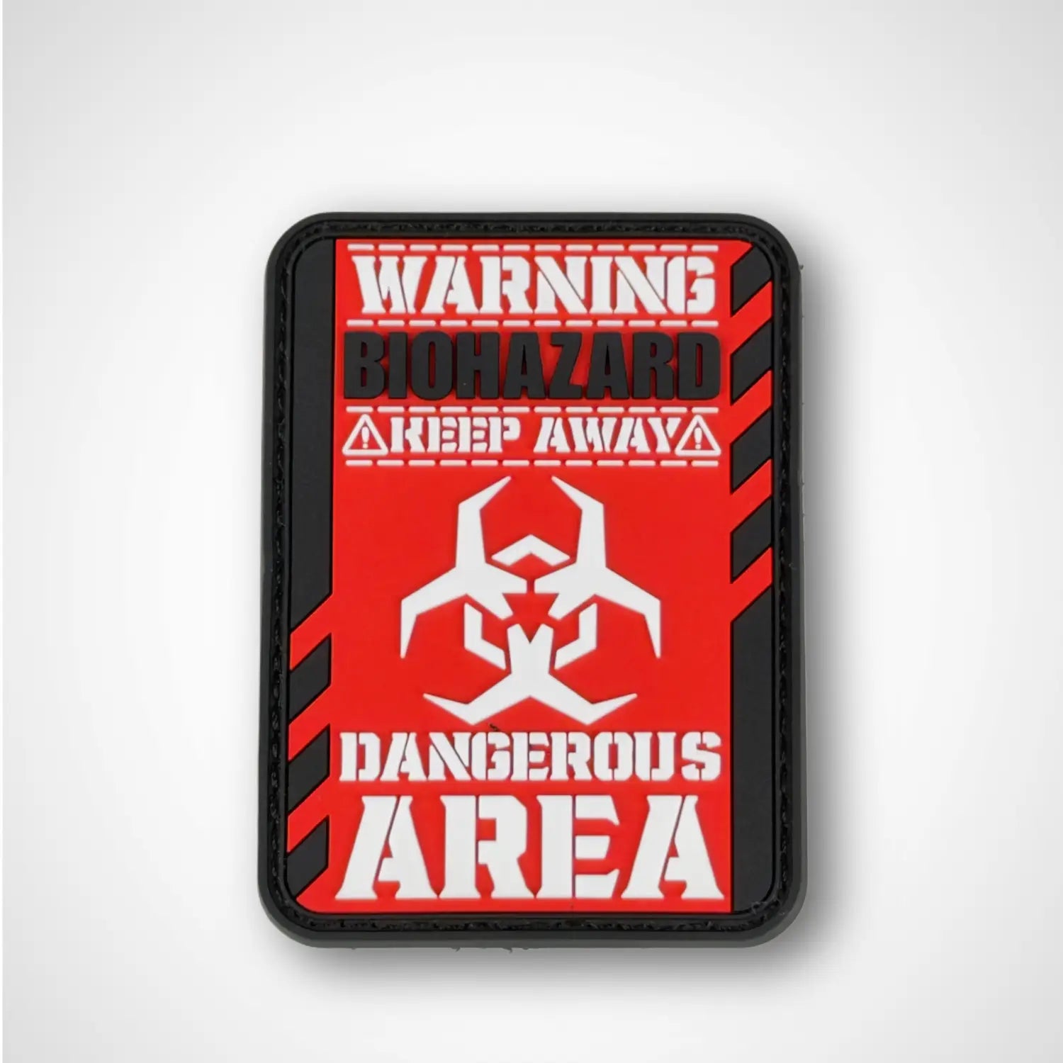 Warning biohazard PVC patch with red, black, and white design on a gray background
