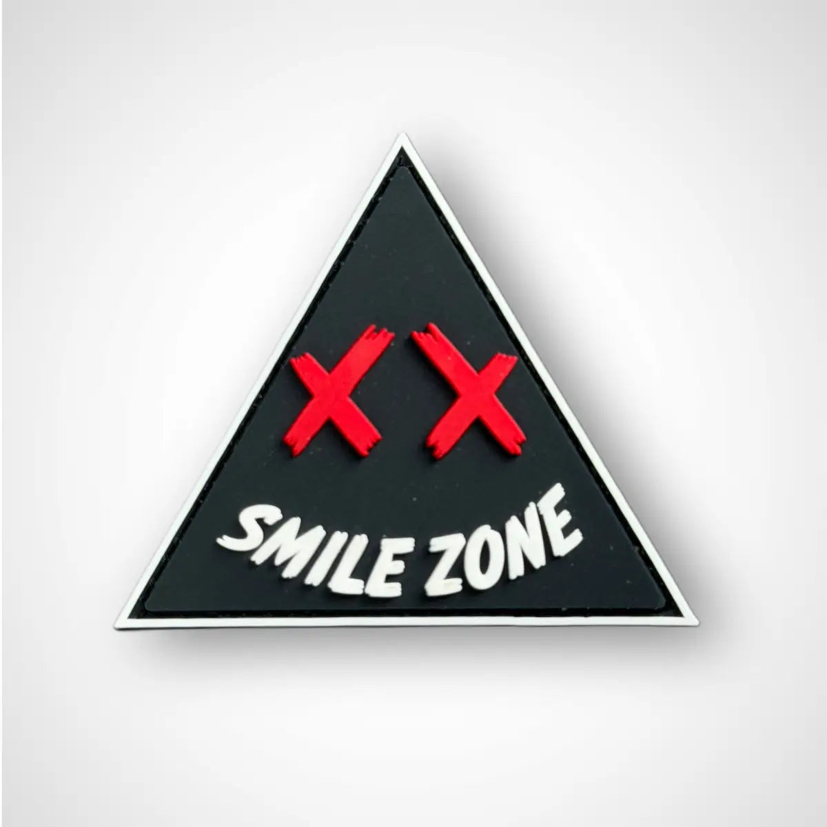 Triangular pvc patch  sign with red 'X' symbols and 'SMILE ZONE' text on a white background