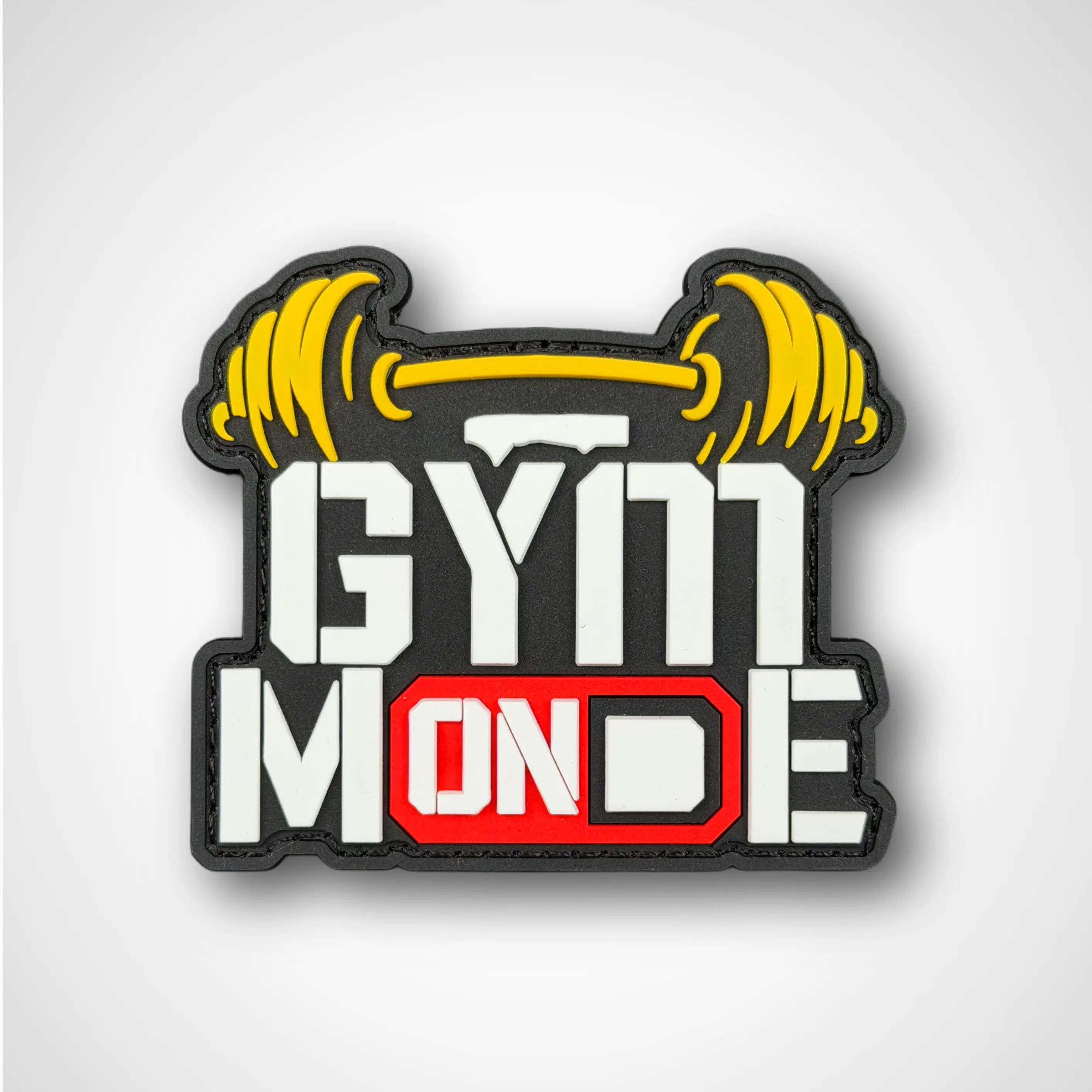 Gym Mode patch with a barbell graphic on a white background